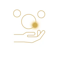 a hand holding a golden ball in the air