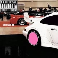 an image of a pink car in front of a car show