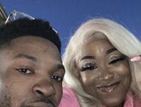 a man and a woman posing for a selfie