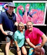 a painting of flamingos