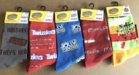 five pairs of socks with different designs on them