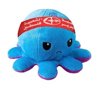 a blue octopus stuffed animal with a red bandana