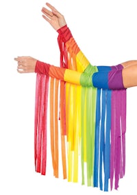 a woman is holding a rainbow colored arm sleeve