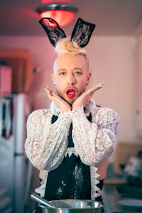 a woman in an apron with bunny ears