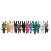 a group of bunny figurines in different colors