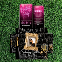 a black and gold birthday party package with a phone and a bottle of champagne