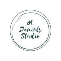 m daniels studio logo