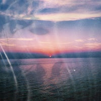 a sunset over a body of water