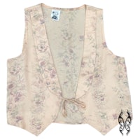 a women's vest with a floral pattern on it