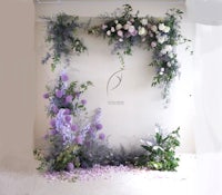 a flower backdrop with purple and white flowers