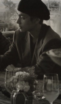 a man and a woman sitting at a table