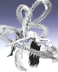 an image of a woman laying on a silver skeleton