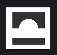 a black and white logo with a sun in the middle
