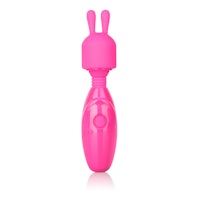 a pink bunny shaped sex toy on a white background