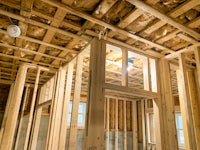 the inside of a house being built with wood framing