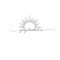 a black background with a sun in the middle of it