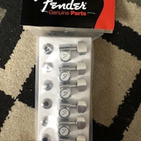 a package of fender guitar parts