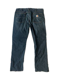 a pair of carhartt jeans on a black background