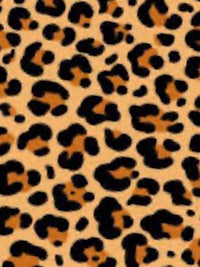 a leopard print fabric with black and brown spots
