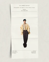 a poster with a picture of a man in a suit