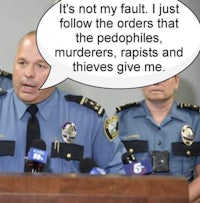 a police officer speaks to a group of people in front of a microphone