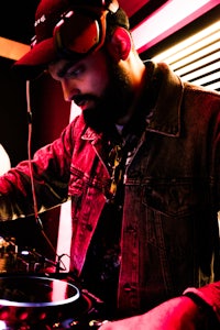 a man wearing a denim jacket