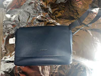 a white cargo pants on a black background