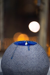 a blue vase on a table