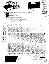 a document with a blue book on it