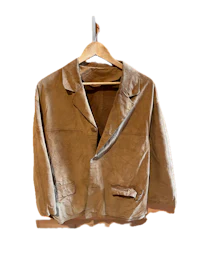 a brown jacket hanging on a hanger