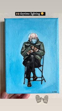 a painting of bernie sanders sitting in a chair