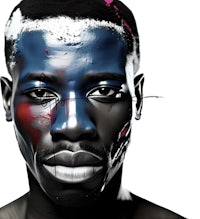 a man with blue and red paint on his face