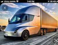 an image of a tesla truck on the road