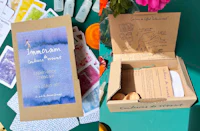 a box with cards and flowers on it