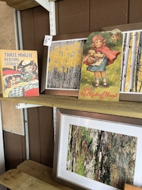 a group of pictures hanging on a wall