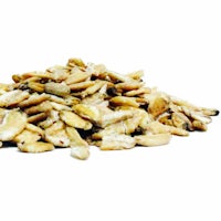 a pile of pumpkin seeds on a white background