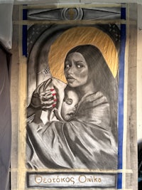 a drawing of a woman holding a baby