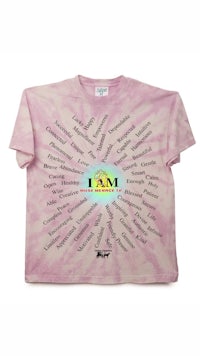 a pink tie dye t - shirt with the words i am
