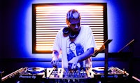 a man is djing in a room