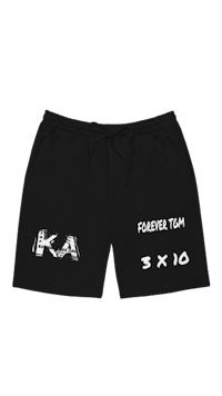 a black shorts with the words forever team on it