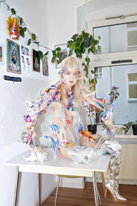 a woman is sitting on a table