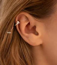 a woman's ear with an ear cuff