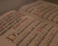 a close up of a book with music on it