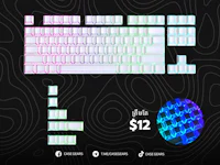 a computer keyboard with a rainbow colored background