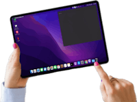 a woman holding up an apple ipad with a purple screen