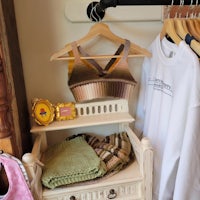 a clothes rack with clothes hanging on it