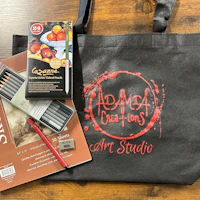 a tote bag with a book and pencils