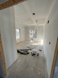 a room that is being remodeled with white walls