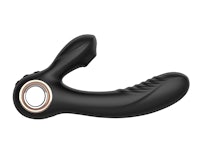 a black sex toy on a white background