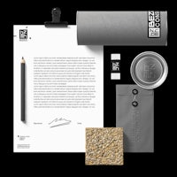 a stationery set with a pen, pencil and paper